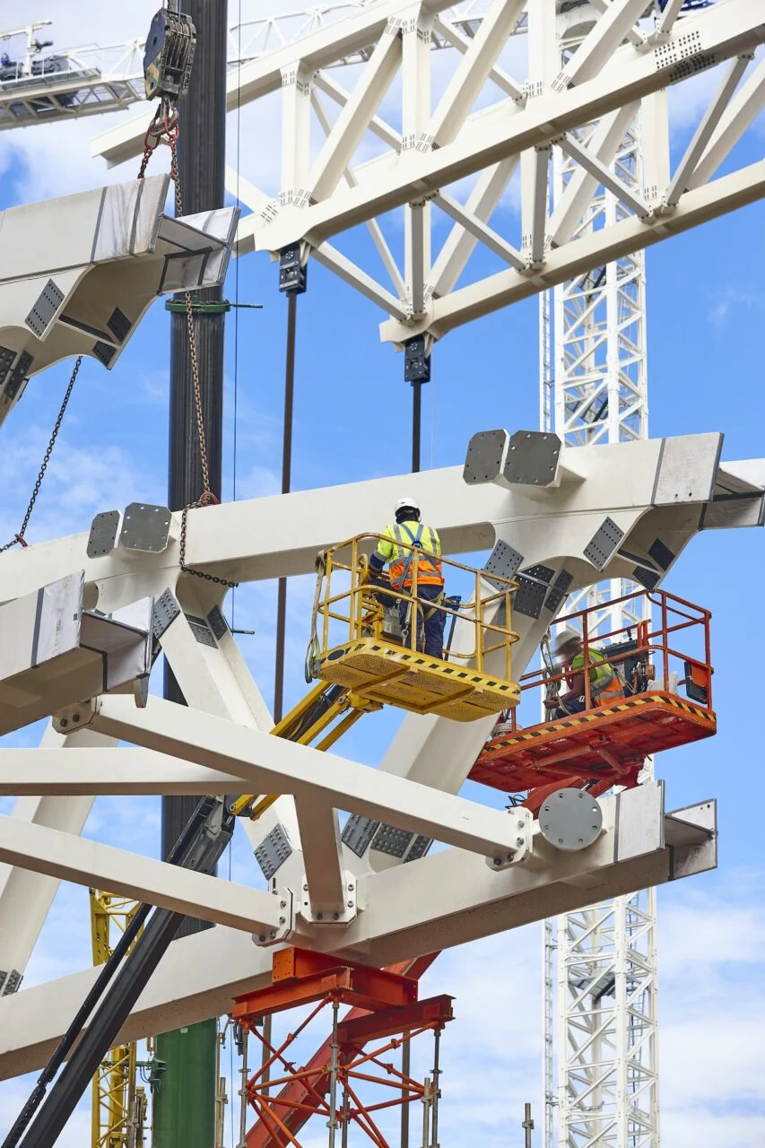 workers-on-a-construction-site-engineering-and-architectural-infrastructure-safety.jpg (WebP)